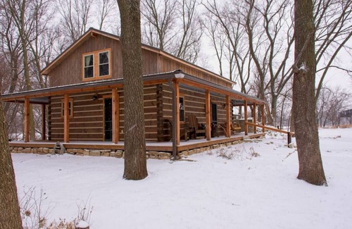 Elmdale Cabin | Unique Paw Print Cabin nestled in the Flint Hills!