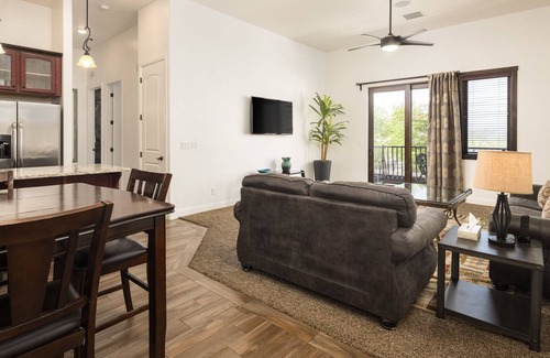 Moab Condo | Unique Stay in Downtown Moab! Master Bedroom Climbing Wall - Elevated Bunks