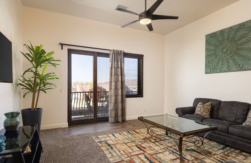 Moab Condo | Unique Stay in Downtown Moab! Master Bedroom Climbing Wall - Elevated Bunks
