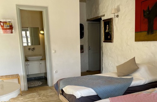 Hydra Apartment | Unwind at a stunning stone-build historic Mansion overlooking the Hydra harbour