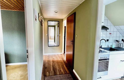 Dornum Apartment | Unwind at the swimming pond
