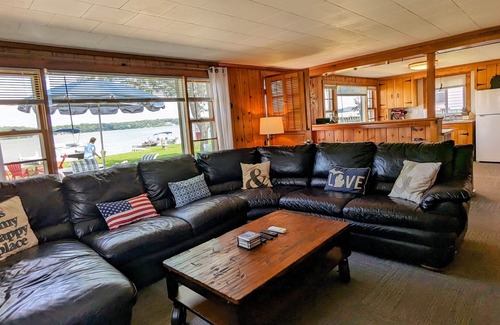 Grant House | Updated cottage with a huge deck, yard, fire pit & pontoon boat in the summer