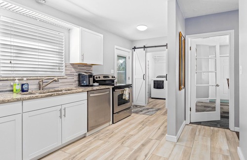 Bradenton House | Updated, dog-friendly home with fenced yard, koi pond, firepit, & W/D