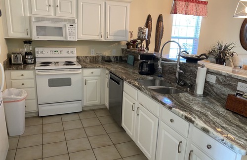 Sunset Beach Condo | Updated ground-level 3 BR/2 BA condo beside pool. Golf, Tennis, and family fun.