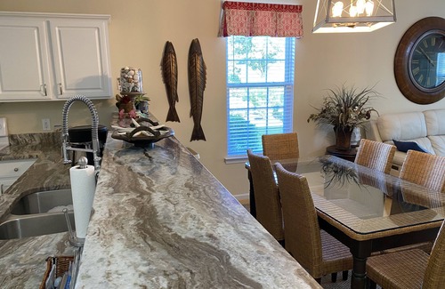Sunset Beach Condo | Updated ground-level 3 BR/2 BA condo beside pool. Golf, Tennis, and family fun.