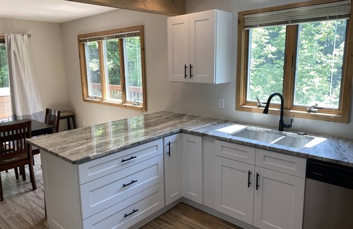 Harbor Springs Condo | Updated Phase 2 Hideaway Valley Condo Nestled in the Woods