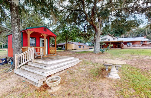 Milton House | Updated waterfront home with spacious outdoor living area, gaming room