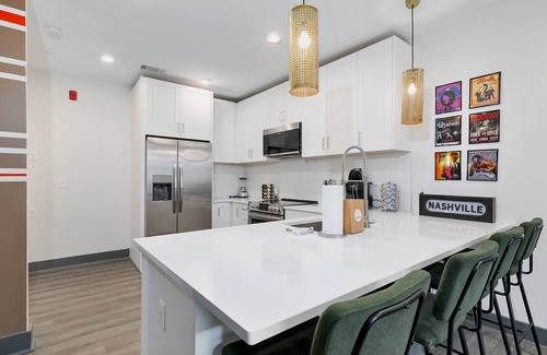 Rolling Mill Hill Condo | Upscale 4th-floor condo near top attractions with fast WiFi & rooftop lounge