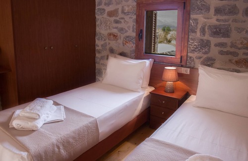 Gythio House | Upscale Beachfront Family Vacation Haven on Private, Gated Residential Property