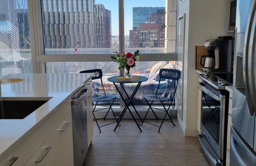 MIT Apartment | Upscale home with breathtaking view, full kitchen, living room and balcony