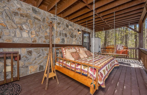 Elk Park Cabin | Upscale mountain log cabin with decks, fireplaces, & two primary bedrooms