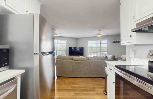 Surf Side Shores House | Upstairs duplex near the beach with deck, outdoor shower, W/D, streaming, & AC