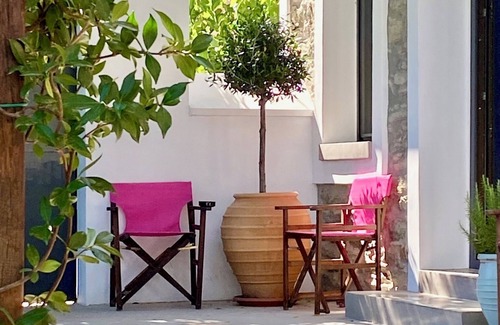 Karystos House | Urban Oasis: Stone House with pool & garden