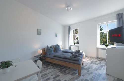 Koenigs Wusterhausen Apartment | Urbanes Dachrefugium mit Balkon