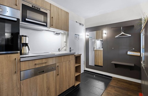 Wremen Apartment | Vacation apartment near the beach with sauna and great, large balcony with XXL beach chair