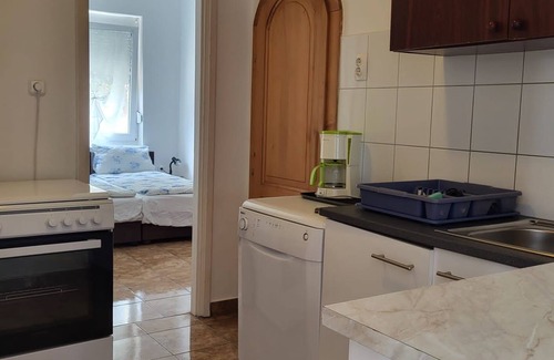 Balatonmariafurdo Apartment | Vacation apartment with pool, WLAN, playground directly on the lake