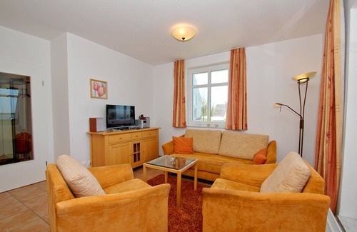 Wiek Apartment | Vacation apartment near the harbor with balcony and sea view - Hafenhäuser Wiek FeWo 01
