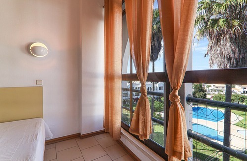 Santa Eulalia Apartment | Vacation Apartment "Apartamentos Ninho das Gaivotas 508" with Pool, Wi-Fi, A/C, Balcony & Garden; Parking Available