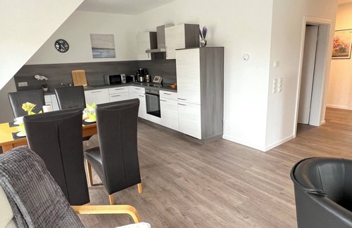 Papenburg Apartment | Vacation apartment "Aurora" Papenburg Large balcony EBK New building 74 sqm Free Wifi 2 bedrooms