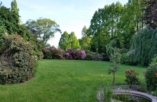 Westerstede Cottage | Vacation apartment "Kaminzimmer" in the 2-stall country house in the Rhodo garden.