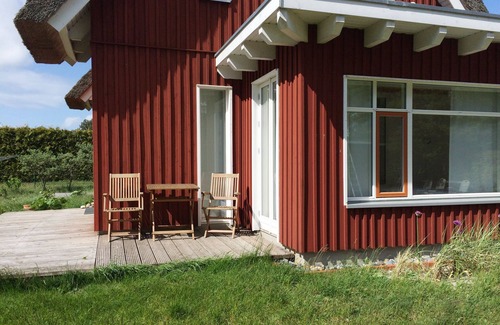 Pruchten Apartment | Vacation apartment in a thatched wooden house - very quiet and idyllic location