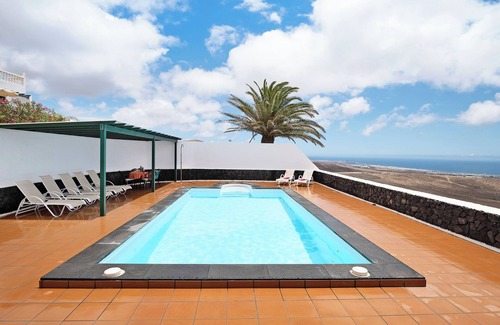 Tias Apartment | Vacation Apartment “La Vega de Lanzarote 4” with Sea View, Pool & Wi-Fi