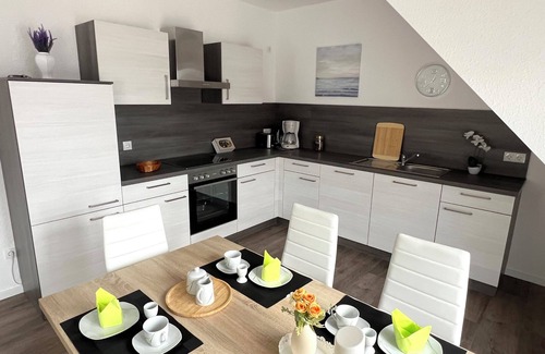 Papenburg Apartment | Vacation apartment "Nautilus" Papenburg roof terrace EBK new building 74 sqm Free Wifi 2 bedrooms