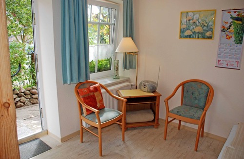 Seedorf Apartment | Vacation apartment Pusteblume with terrace - Appartementhaus zur Brücke directly on the