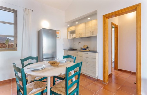 Lajares Apartment | Vacation 'Dragón Y Suerte Lajares Pool' with Mountain View, Shared Pool and Wi-Fi