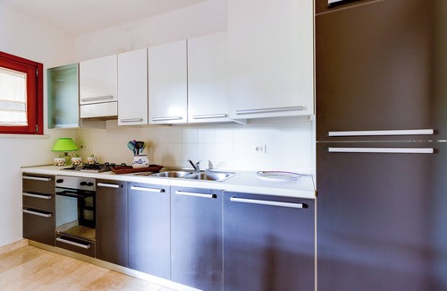 Narbolia House | Vacation Home "Antonella Sul Golf" with Shared Pool, Private Terrace & Wi-Fi