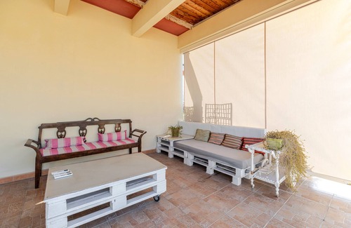 Oristano Historic Centre House | Vacation Home 'Cappuccini Apartment Superior' with Large Private Terraces & A/C