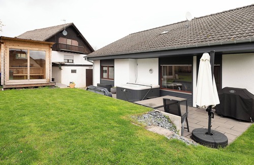 Waxweiler House | Vacation home Eifel-Resort with garden, sauna, whirlpool, terrace and wifi