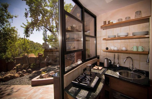 Garafia House | Vacation home El Sitio with pool - secluded location above the clouds, sea view, sauna, fireplace