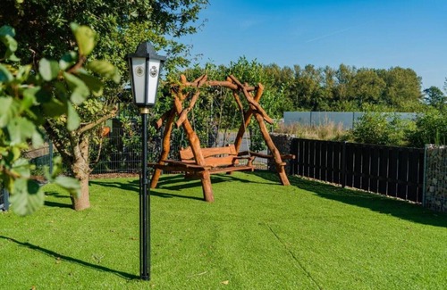 Barssel House | Vacation home "Juist" with 105sqm - in the vacation park Harkebrügge
