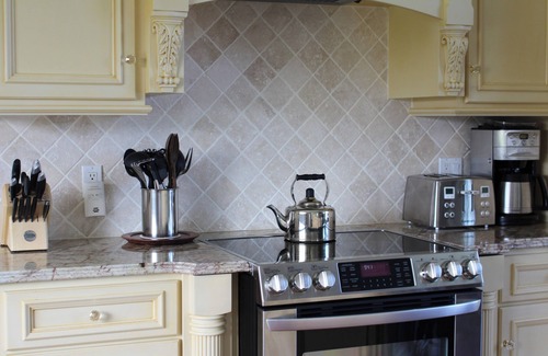 French Village House | Vacation Home Located Steps from North Shore Beach, 10 Minutes Away From Golf