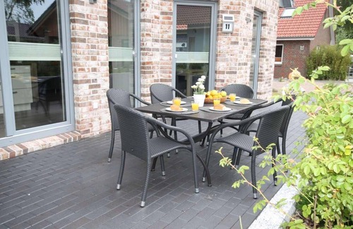 Pelzerhaken House | Vacation home near the beach for 6 people and dog with fireplace & garden in a quiet location.
