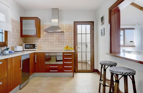 Arrieta Villa | Vacation Villa 'Turqué' with Sea View, Private Pool and Wi-Fi