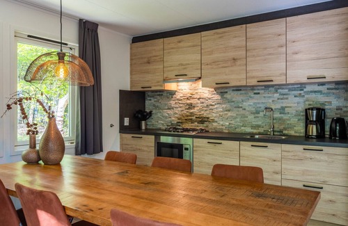 Municipality of Westerveld Ski Chalet | Vakantiepark De Wiltzangh - Fins Chalet Hottub 6