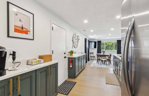 Vermilion House | Vermilion Getaway - Hot Tub Game Room Patio