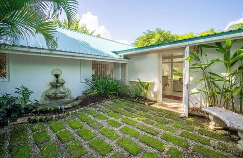 Holder's Hill House | Vibrant 4-Bedroom Villa with Pool & Polo Views, Steps from Paynes Bay Beach.