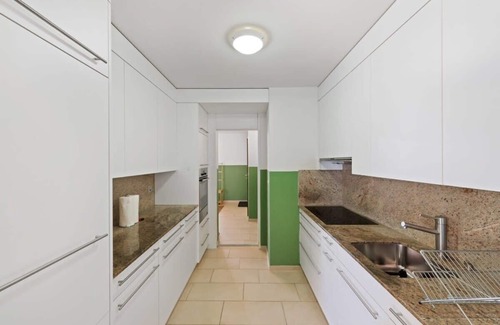 District 8 Apartment | Vibrant View: Sunlit Splendor
