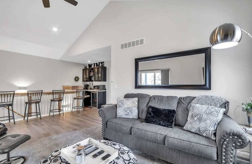 Lake Fenton Apartment | View of Lake Fenton with hot tub and fire place