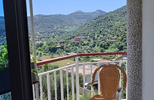 Vlore House | View with balcony in Villa 32 (Oliven)