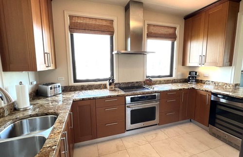 Zarzal Condo | Views! Views! Penthouse with Membership Golfing, Beach, Pool and 2 Carts