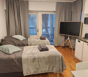 Turku Apartment | Viihtyisä korkealuokkainen, tilava ja parvekkeellinen yksiö Logomolla 1-2hlö