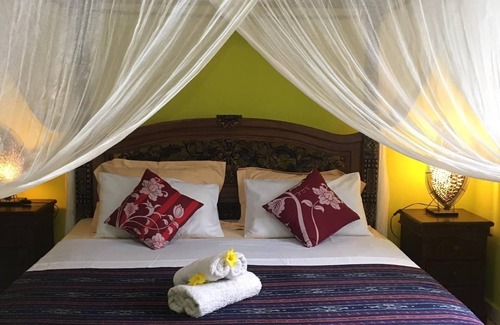 Sukasada Bed & Breakfast | Villa Ayu offers stunning view over mountains green valley with waterfall