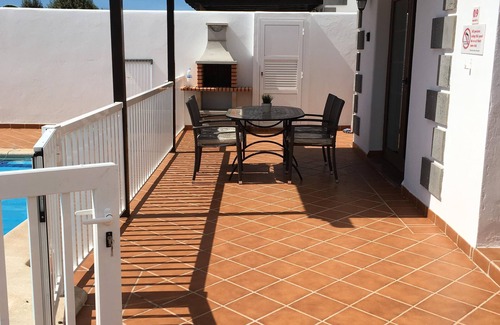 Playa Blanca Villa | Villa Cara: Beautiful modern villa with gated heated pool & air con.
