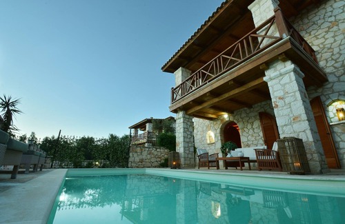Akrotiri Villa | Villa Elektra of Jootiq Villas. Combine traditional stone built concept with supreme comfort!