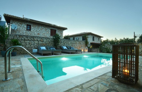 Akrotiri Villa | Villa Elektra of Jootiq Villas. Combine traditional stone built concept with supreme comfort!
