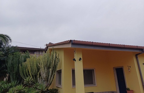 Brancaleone Marina Villa | Villa entirely surrounded by garden a stone's throw from the sea.